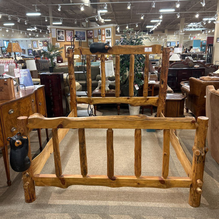 Log Bed with Carved Bears