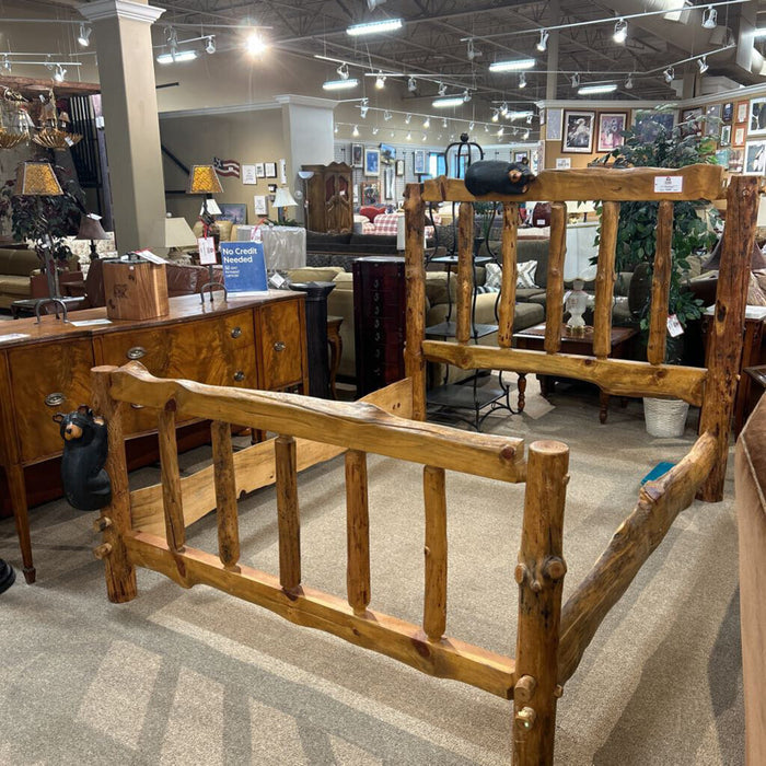 Log Bed with Carved Bears