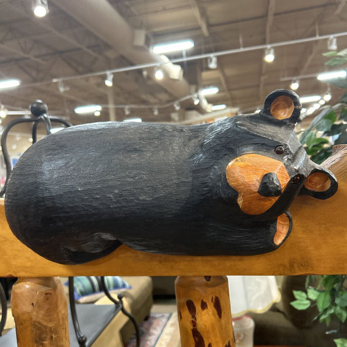 Log Bed with Carved Bears